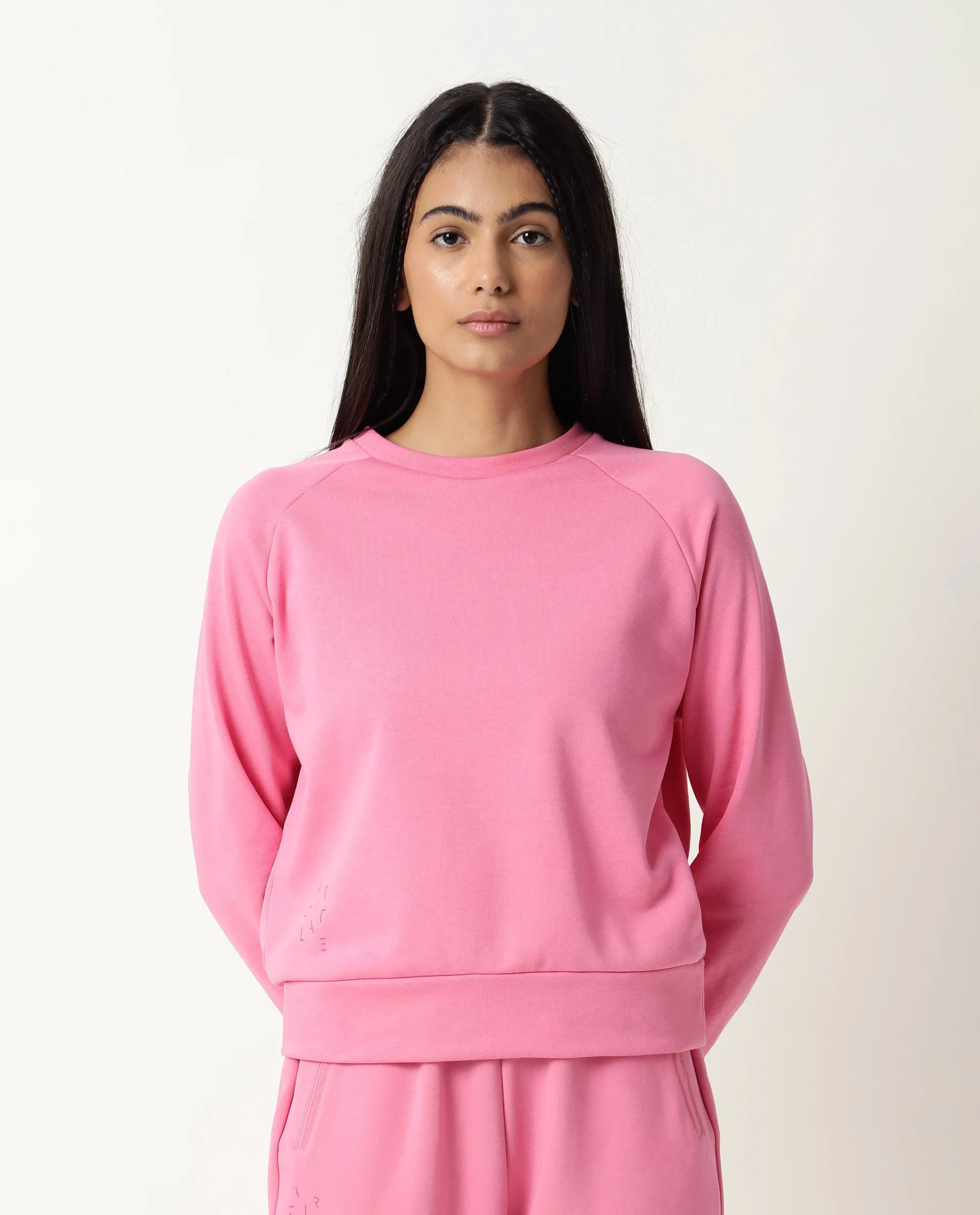 Rareism Women Cax Flouroscent Pink Cotton Blend Fabric Relaxed Fit Full Sleeves Solid Round Neck Sweatshirt