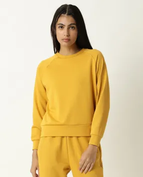 Rareism Women Cax Mustard Cotton Blend Fabric Relaxed Fit Full Sleeves Solid Round Neck Sweatshirt