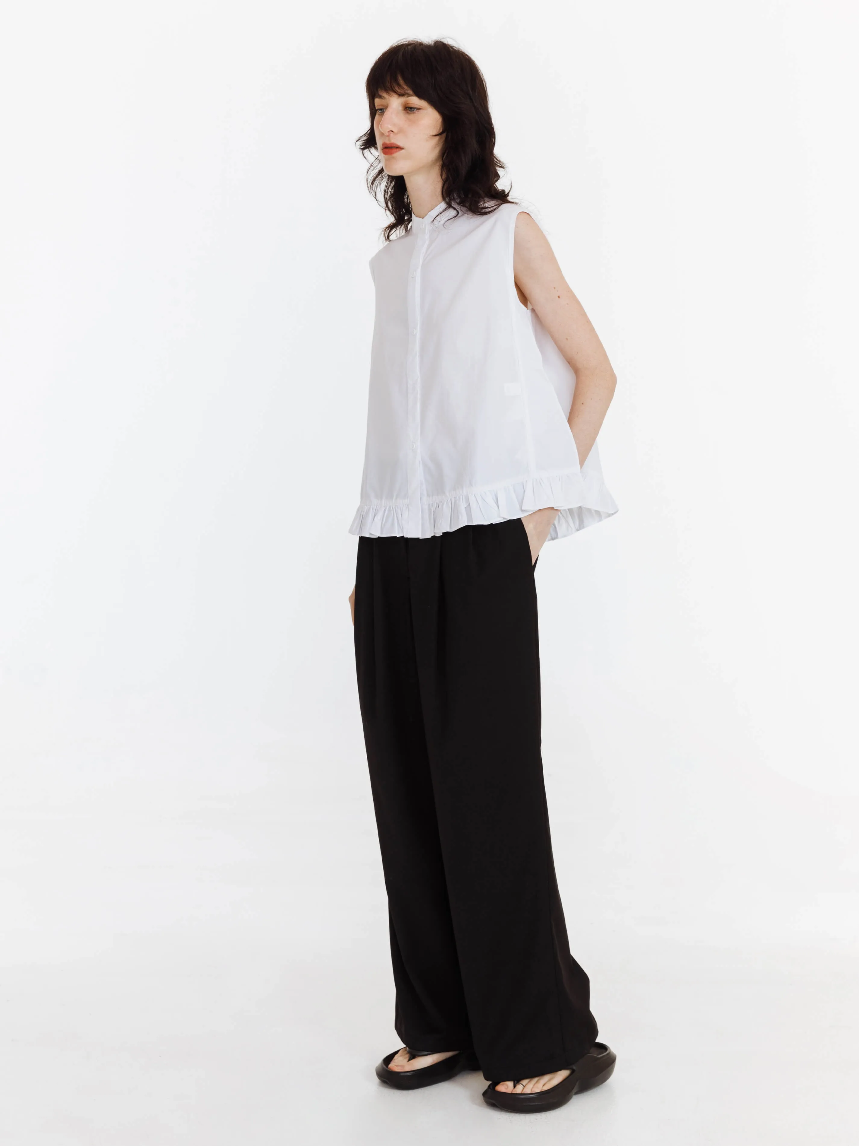 Sleeveless Casual Top with Ruffled Hem